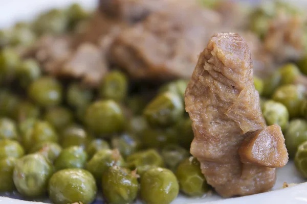 Veal stew with peas — Stock Photo, Image