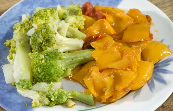 steamed broccoli and bell peppers