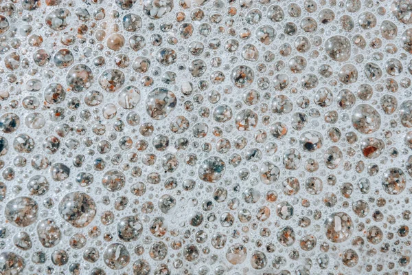 Suda köpüklü doku. Deniz köpüğü..