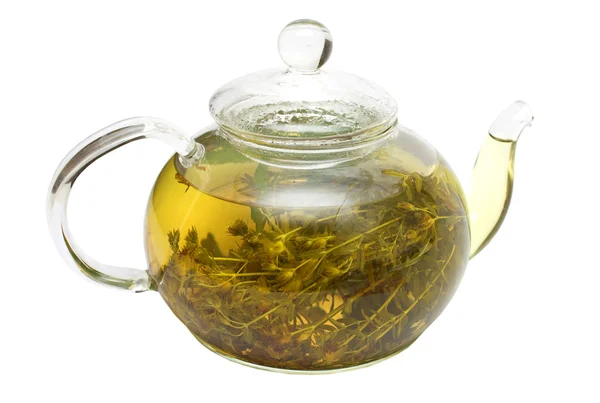 Glass teapot with Hypericum — Stock Photo, Image