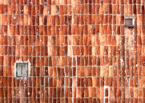 Wall with roof tiles — Stock Photo, Image