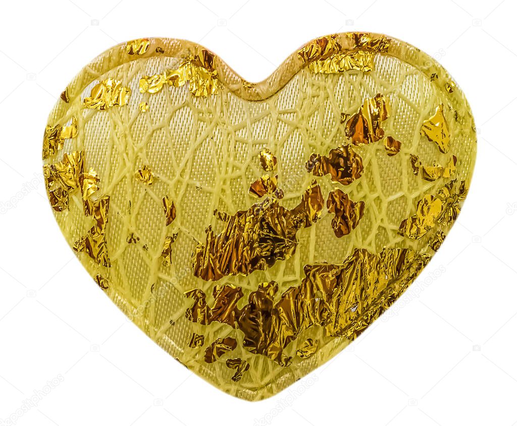 Yellow heart decoration from textile with foil elements isolated on white background. 