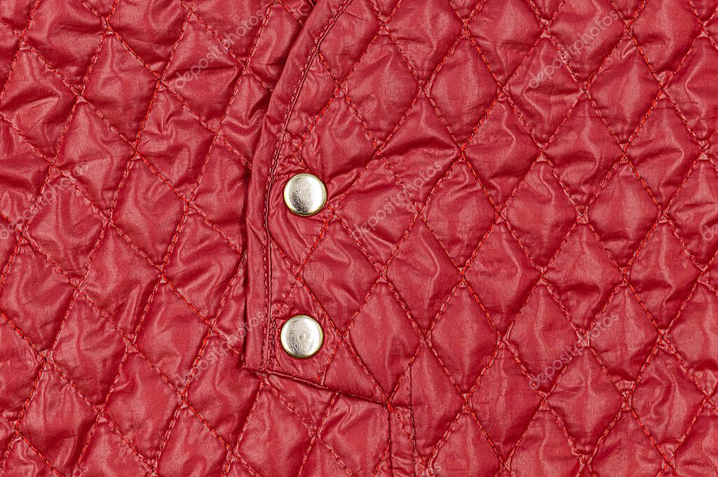 Fondo de tela de Bolonia roja con rombos de costura y botones de metal