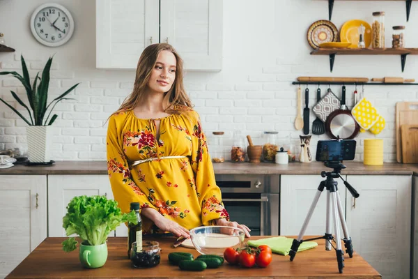 Young Pretty Pregnant Girl Blogger Shoots Video Salad Recipe Smartphone Stock Image