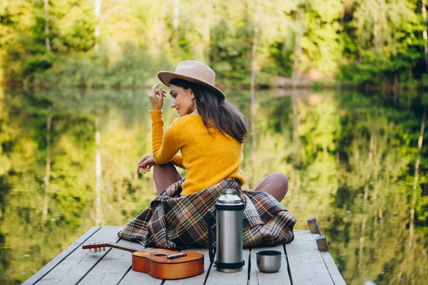 Young Woman Sits Guitar Bridge Lake Autumn Landscape Toning — Stock Photo, Image