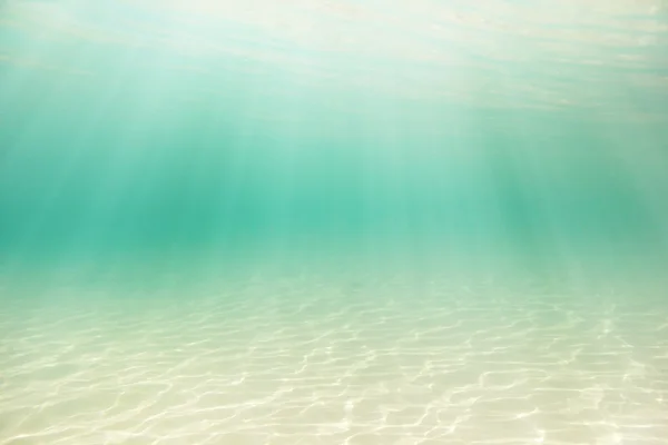 Dno morskie z wody niebieski tło powitalny fala — Zdjęcie stockowe
