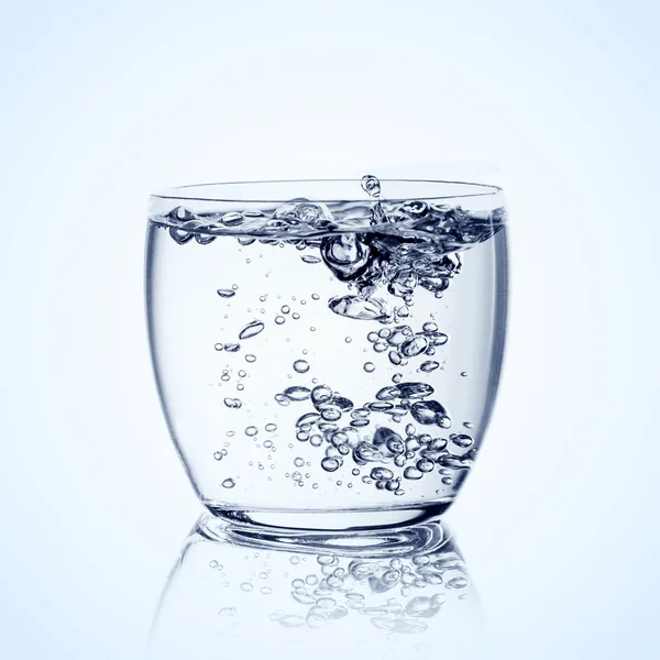 Glass with water over white background — Stock Photo, Image