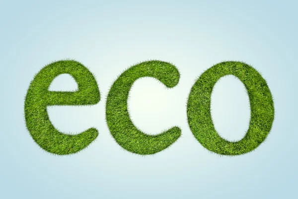 Öko-Wortform von grünem Gras über blauem Hintergrund — Stockfoto