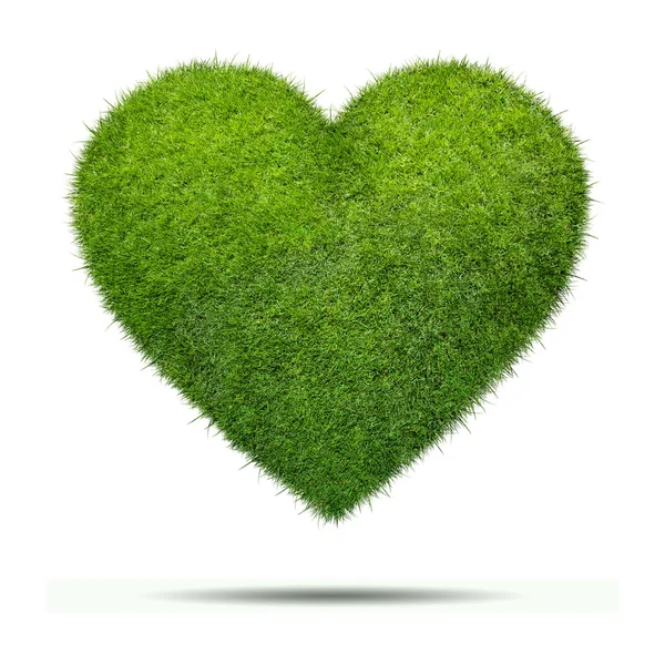 Forma do coração de grama verde isolado emfundo branco — Fotografia de Stock