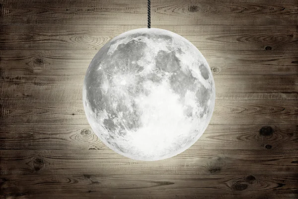 Lua cheia sobre fundo de madeira — Fotografia de Stock