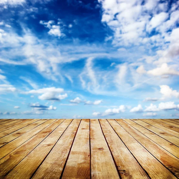 Sky with clouds and wood planks Stock Photo