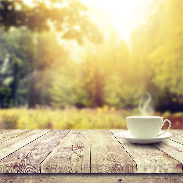 Cup with hot drink — Stock Photo, Image