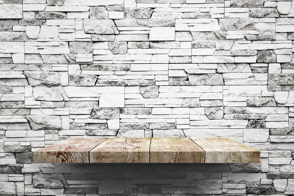 Wooden shelf on brick wall — Stock Photo © robertsrob 67707723