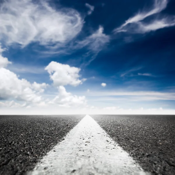Asphalted highway over  sky — Stock Photo, Image
