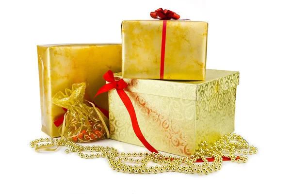 Golden christmas gift boxes isolated — Stock Photo, Image