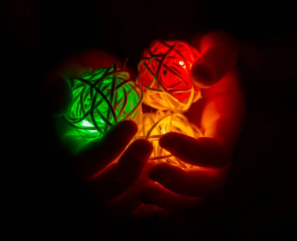 bright garland, like a traffic light in the hands of a child, Christmas decorations