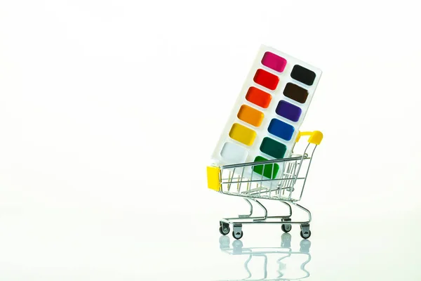 School Paints Grocery Cart Light Background Reflection Close — 스톡 사진