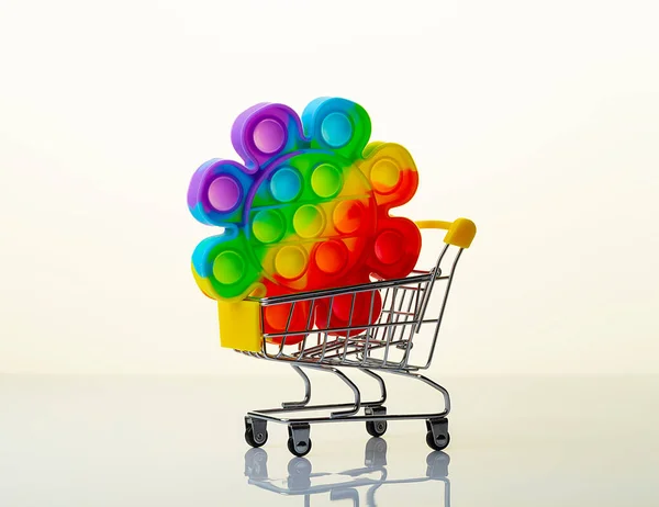 Children Stress Toy Shopping Cart White Background Reflection Close — 스톡 사진
