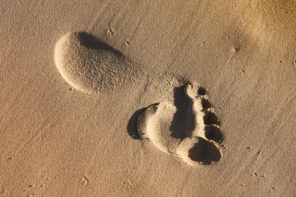 Pegada de praia na areia — Fotografia de Stock