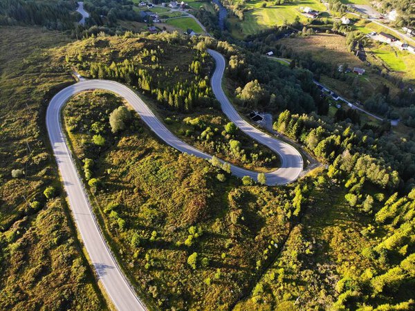 Norway drone view. Aheim winding mountain road in Vanylven Municipality.