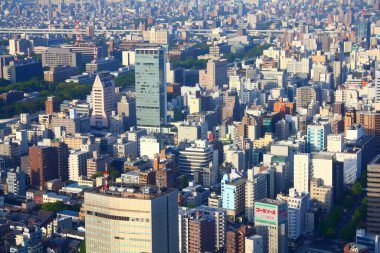 NAGOYA, JAPONYA - 28 Nisan 2012: Nagoya, Japonya 'daki modern şehrin havadan görünüşü. Nagoya 2.28 milyonluk nüfusuyla Japonya 'nın dördüncü büyük şehridir..