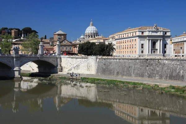 Rome city skyline, Italy. Beautiful Rome view with Vatican Saint Peter\'s Basilica in background. River Tevere (The Tiber).