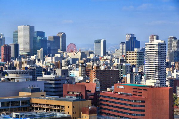 OSAKA, JAPAN - NOVEMBER 22, 2016: Urban skyline of Umeda, Osaka city, Japan. Osaka belongs to 2nd largest metropolitan area of Japan (19.3 million people).