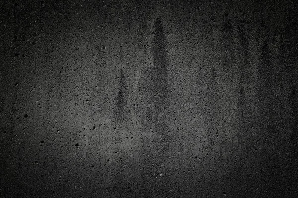 Grunge background - concrete wall or cement wall texture. Dark concrete background.