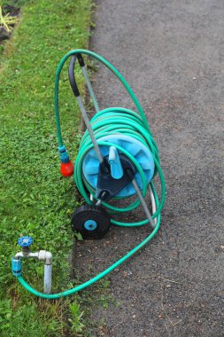 Bahçe hortumu tramvayı. Yararlı bahçe ekipmanları.