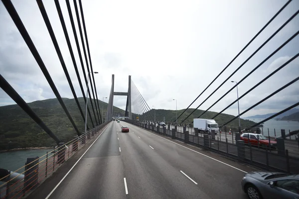 On the left side at highway driving route and bridge