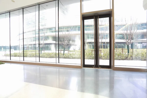 New bright empty building with glass door — Stock Photo, Image
