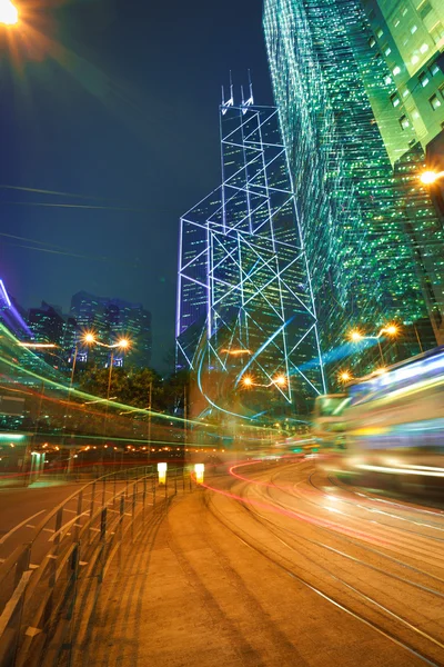 Road light trails on streetscape buildings backgrounds in HongKo — Stock Photo, Image