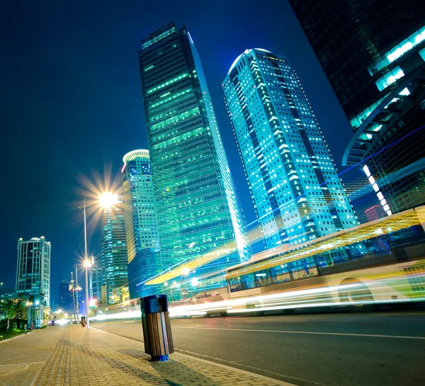 Road light trails on streetscape office buildings in shanghai Royalty Free Stock Images