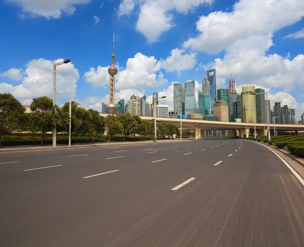 Empty road surface with shanghai bund city buildings — Stock Photo, Image