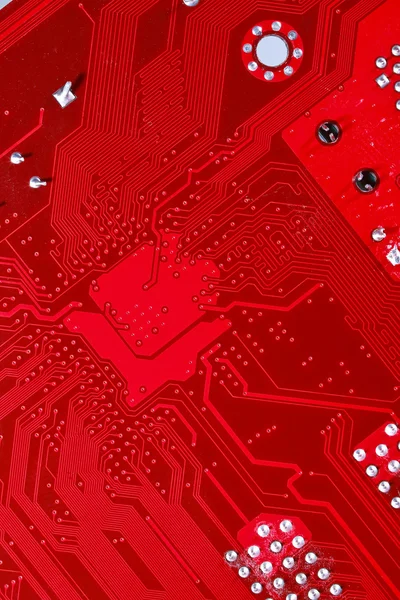 コンピューターのマザーボードの赤い基板テクスチャ背景 — ストック写真