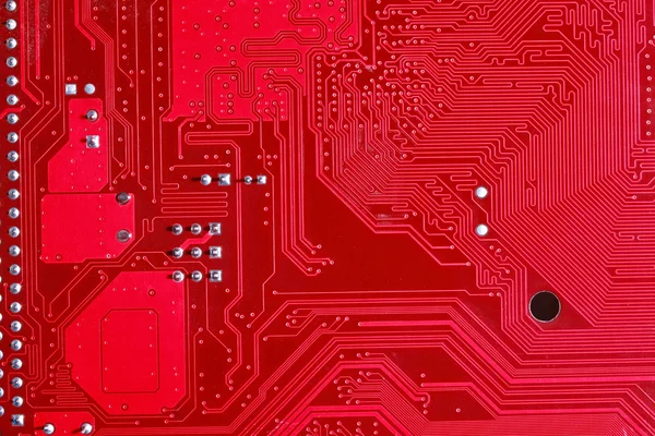 Fondo de textura de placa de circuito rojo de la placa base del ordenador —  Fotos de Stock