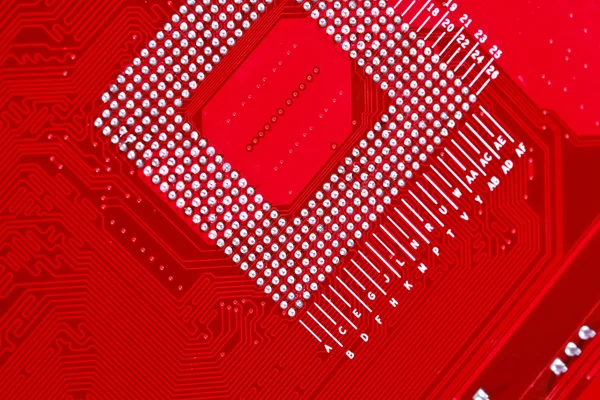 Rode printplaat textuur achtergrond van computer moederbord — Stockfoto