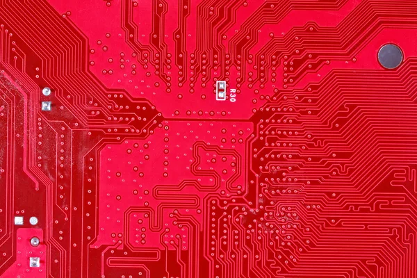 コンピューターのマザーボードの赤い基板テクスチャ背景 ロイヤリティフリーのストック写真