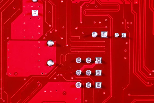 Painel de circuito vermelho textura fundo da placa-mãe do computador — Fotografia de Stock