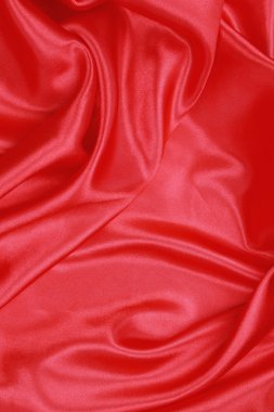 Dalgalı arka plan kırmızı ipek kumaştan