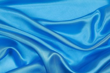 Dalgalı arka plan mavi ipek kumaştan