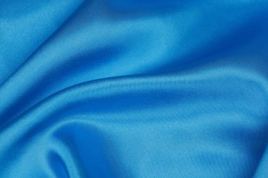 Dalgalı arka plan mavi ipek kumaştan