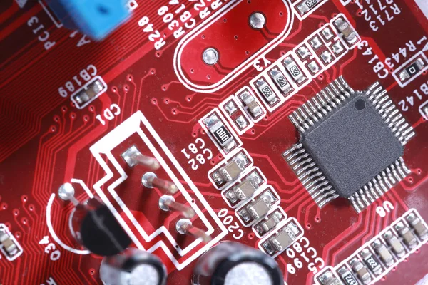 Közeli kép a piros elektronikus áramköri processzor — Stock Fotó