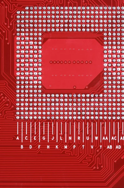 Текстура дошки червоного кольору фону материнської плати комп'ютера — стокове фото