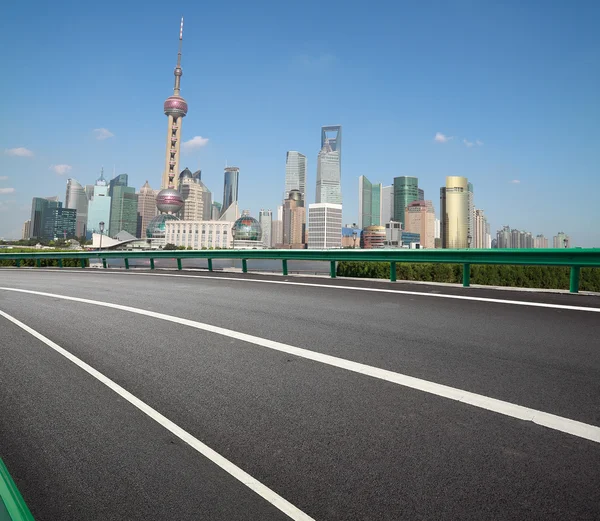 Empty road with Shanghai Lujiazui city buildings — Stock Photo, Image