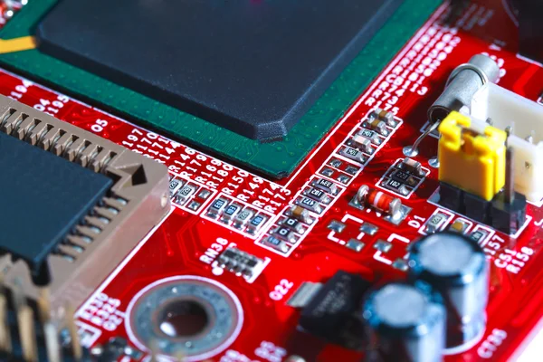 Vértes piros elektronikus alaplap áramköri processzor — Stock Fotó