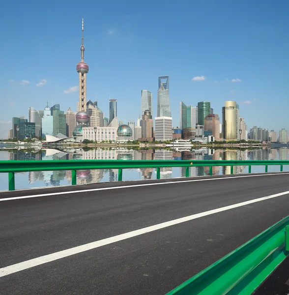 Empty road with Shanghai Lujiazui city buildings — Stock Photo, Image