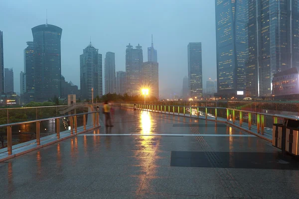 Empty marble floor road with modern city architecture background — Stock Photo, Image