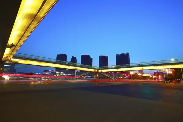 Urban footbridge and road intersection of night scene