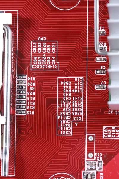 Close-up of electronic circuit red board with processor of compu